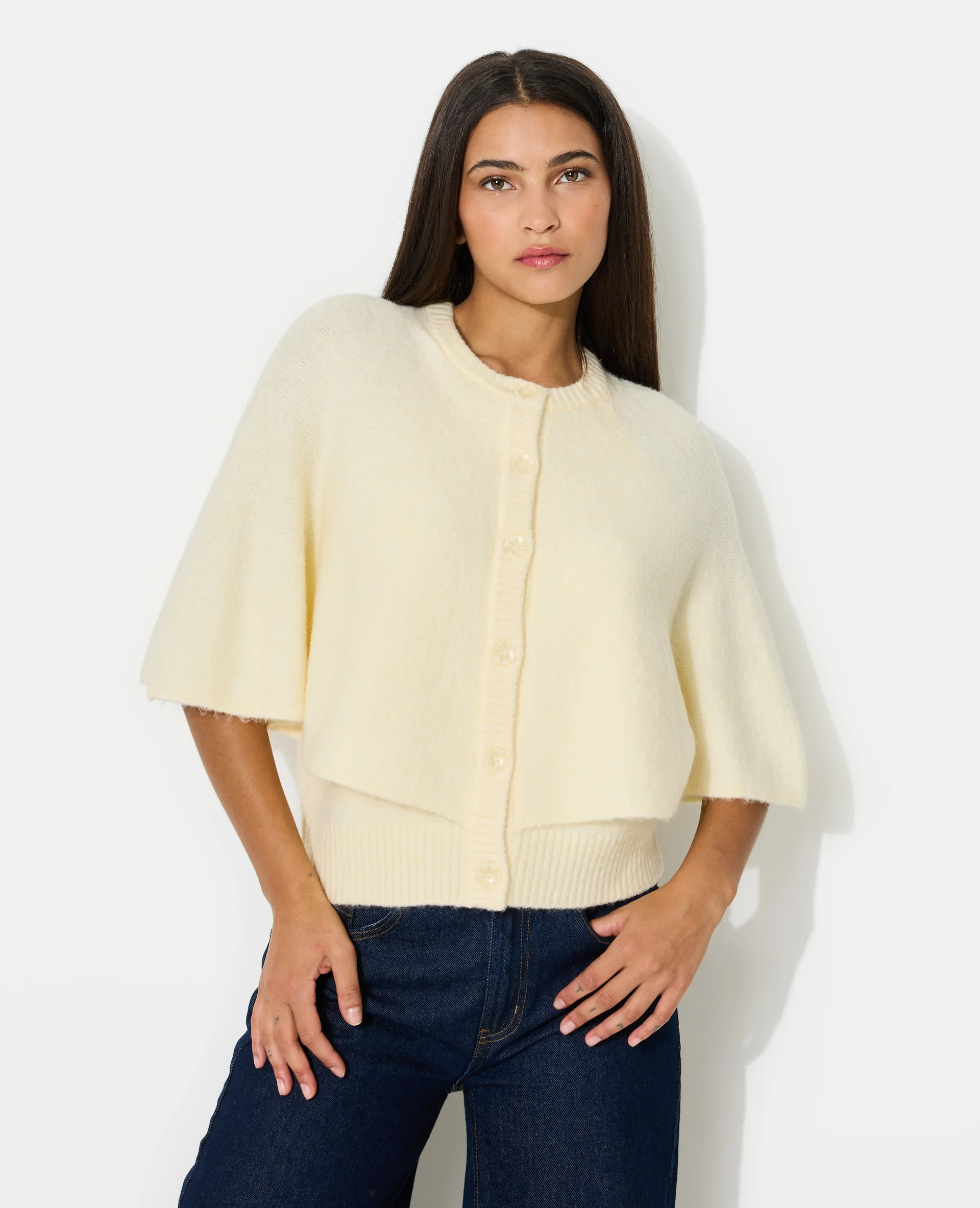 Gilet cape avec boutons