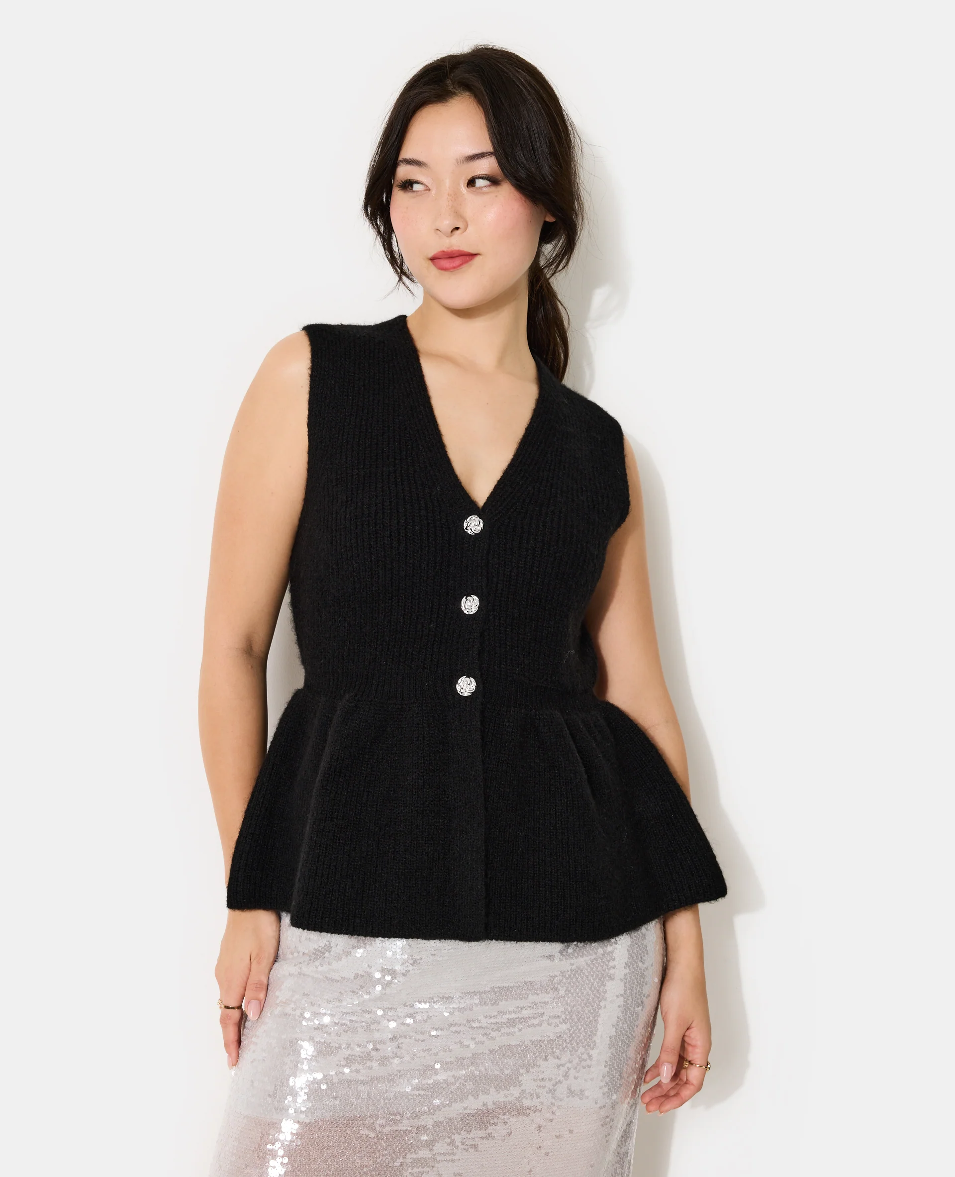 Gilet sans manches forme peplum
