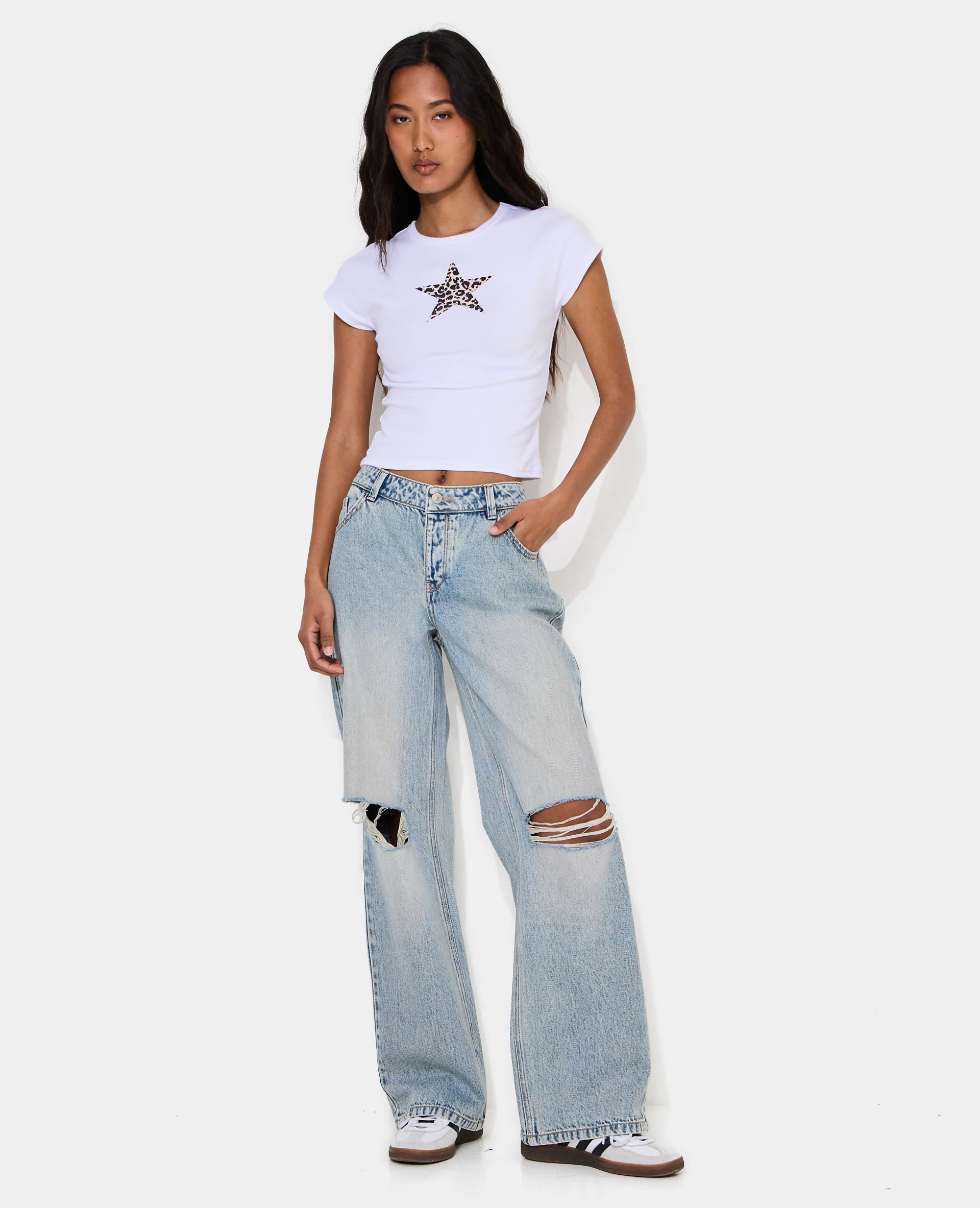 Jean wide taille basse avec trous genoux